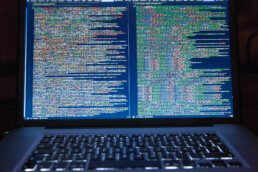 split screen on laptop representing two databases