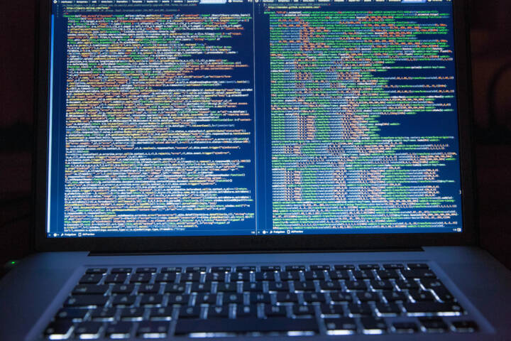 split screen on laptop representing two databases