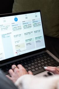 Dental website design showing a schedule on a laptop for an independent dental practice