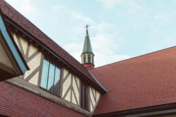 specialty roofing lead generation platform - photo of a historic building roof with spire