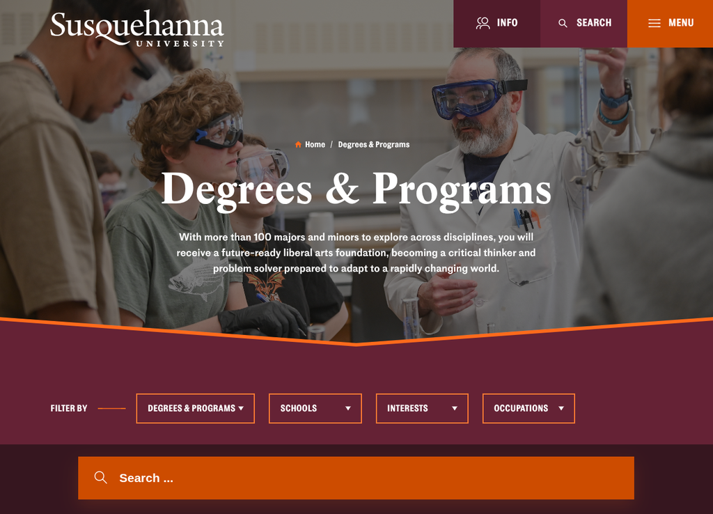 Susquehanna University website review. screenshot of the degrees and programs page, including a photo of a chemistry professsor with students, program filtering options, and search box.